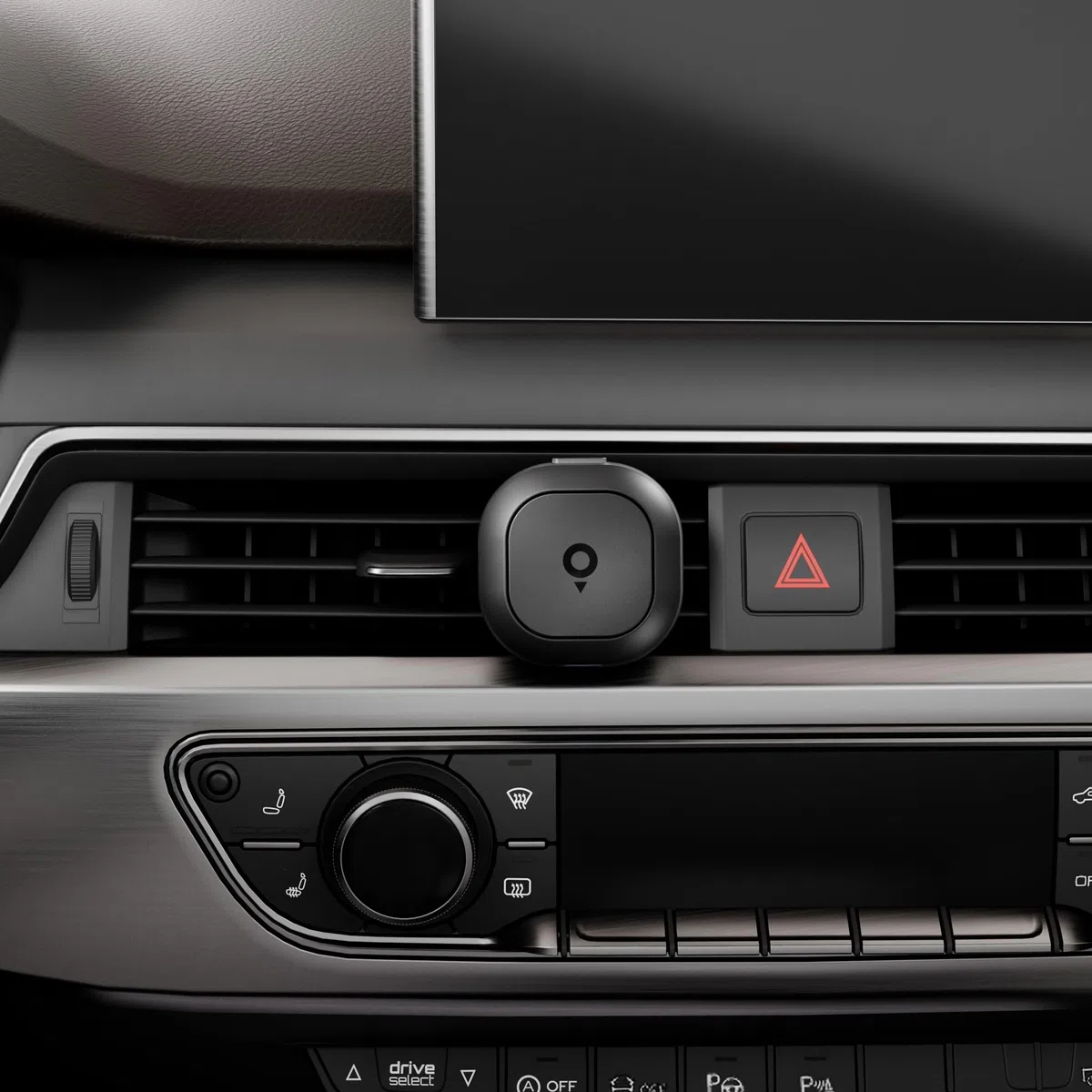 TomTom magnetyczny uchwyt do kratki wentylacyjnej stabilnie i bezpiecznie utrzymuje Twojego asystenta drogowego Tom