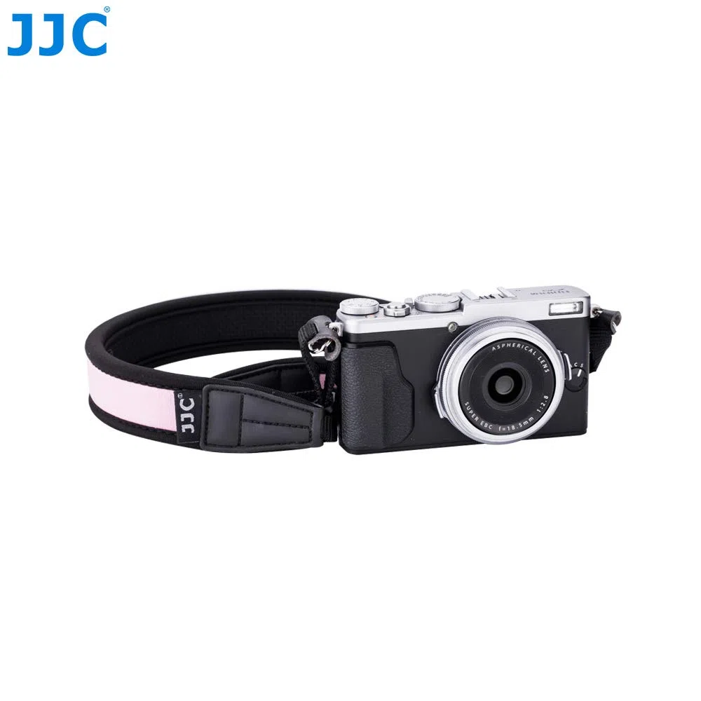 JJC NS-OA1 - zestaw okrągłych skórzanych pierścieni mocujących z paskiem do aparatu Fujifilm X70, X-E2S i innych aparatów z podobnymi okrągłymi oczkami.