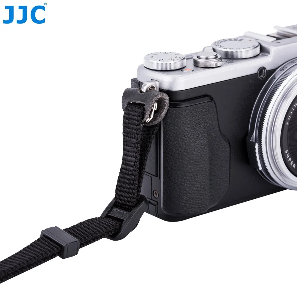 JJC NS-OA1 - zestaw okrągłych skórzanych pierścieni mocujących z paskiem do aparatu Fujifilm X70, X-E2S i innych aparatów z podobnymi okrągłymi oczkami.